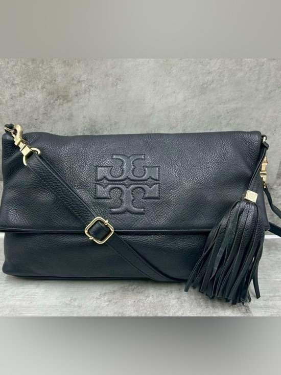Tory Burch Handbags - Tory Burch Black Pebbled Leather Fold-Over Shoulder Bag with Tassel (Dust Bag)